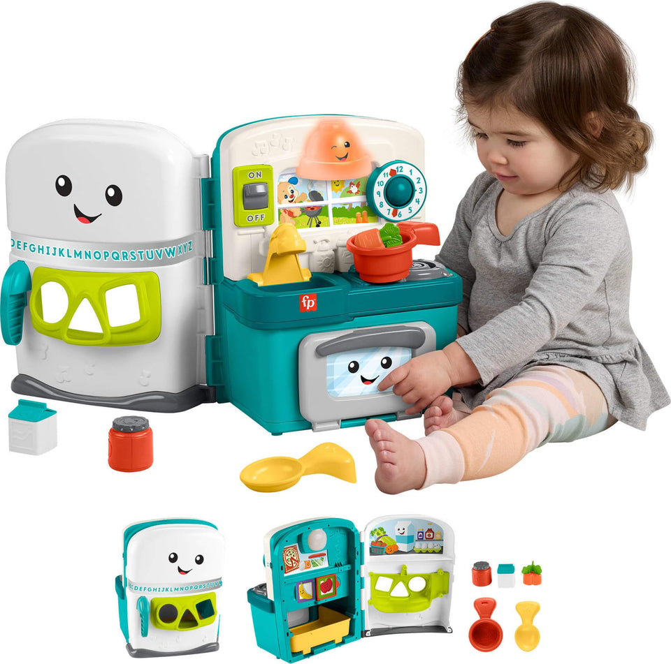 Fisher-Price Laugh & Learn kitchen pantry opens for imaginative play and language exploration.