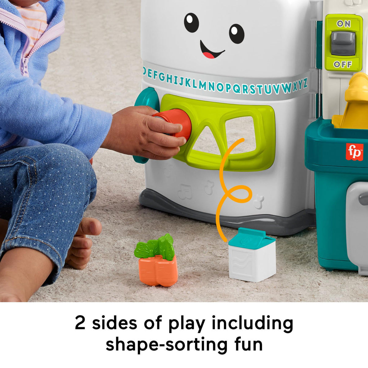 Fisher-Price Laugh & Learn kitchen roller bar spins to show cause and effect.