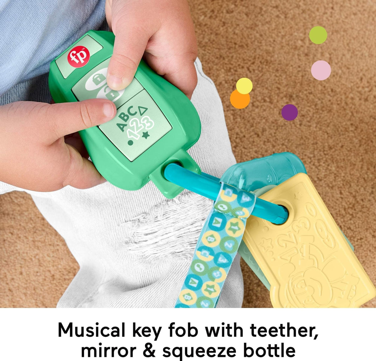 Fisher-Price chewy teether badge supports sensory exploration during play.