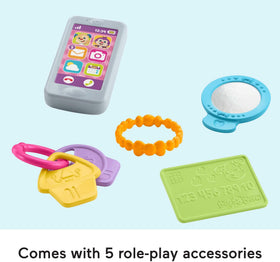 Fisher-Price Laugh & Learn Smart Purse compact mirror promotes role-play interactions.