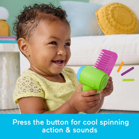 Fisher-Price Laugh & Learn Vanity comb supports fine motor skills during dress-up