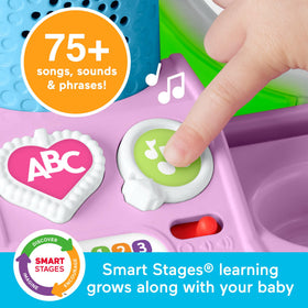 Fisher-Price Laugh & Learn Vanity hair dryer spins for realistic grooming fun
