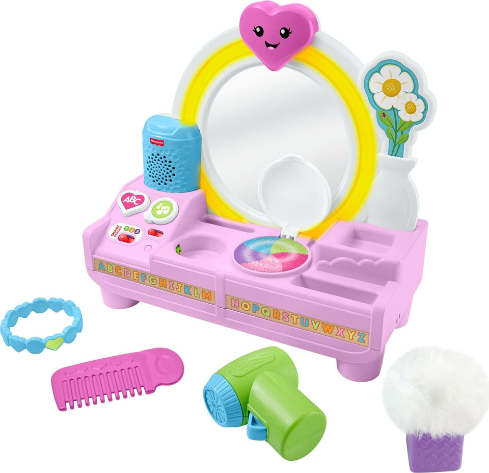 Fisher-Price Laugh & Learn Vanity mirror lights up to spark imaginative pretend play