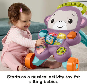 Fisher-Price Learn with Me with light-up buttons engaging babies during play.