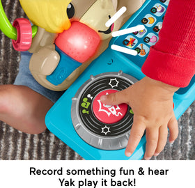 Yak microphone light flashes in rhythm to engage toddlers.