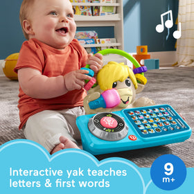 Yak turntable spins to trigger music and cause‑and‑effect learning.