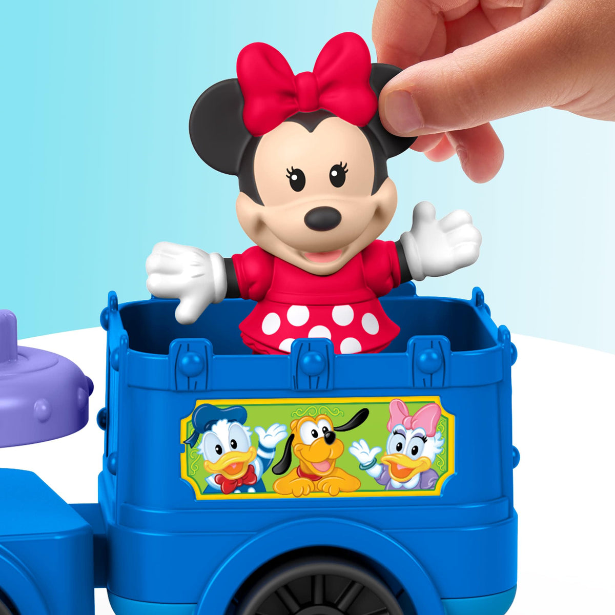 Fisher-Price Little People Disney Jr conductor seat press triggers cheerful music.