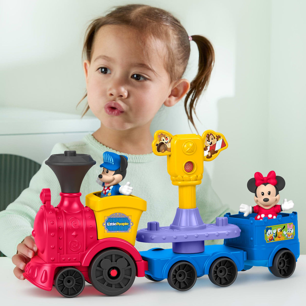 Fisher-Price Little People Disney Jr Mickey & Minnie figures spark imaginative pretend play.