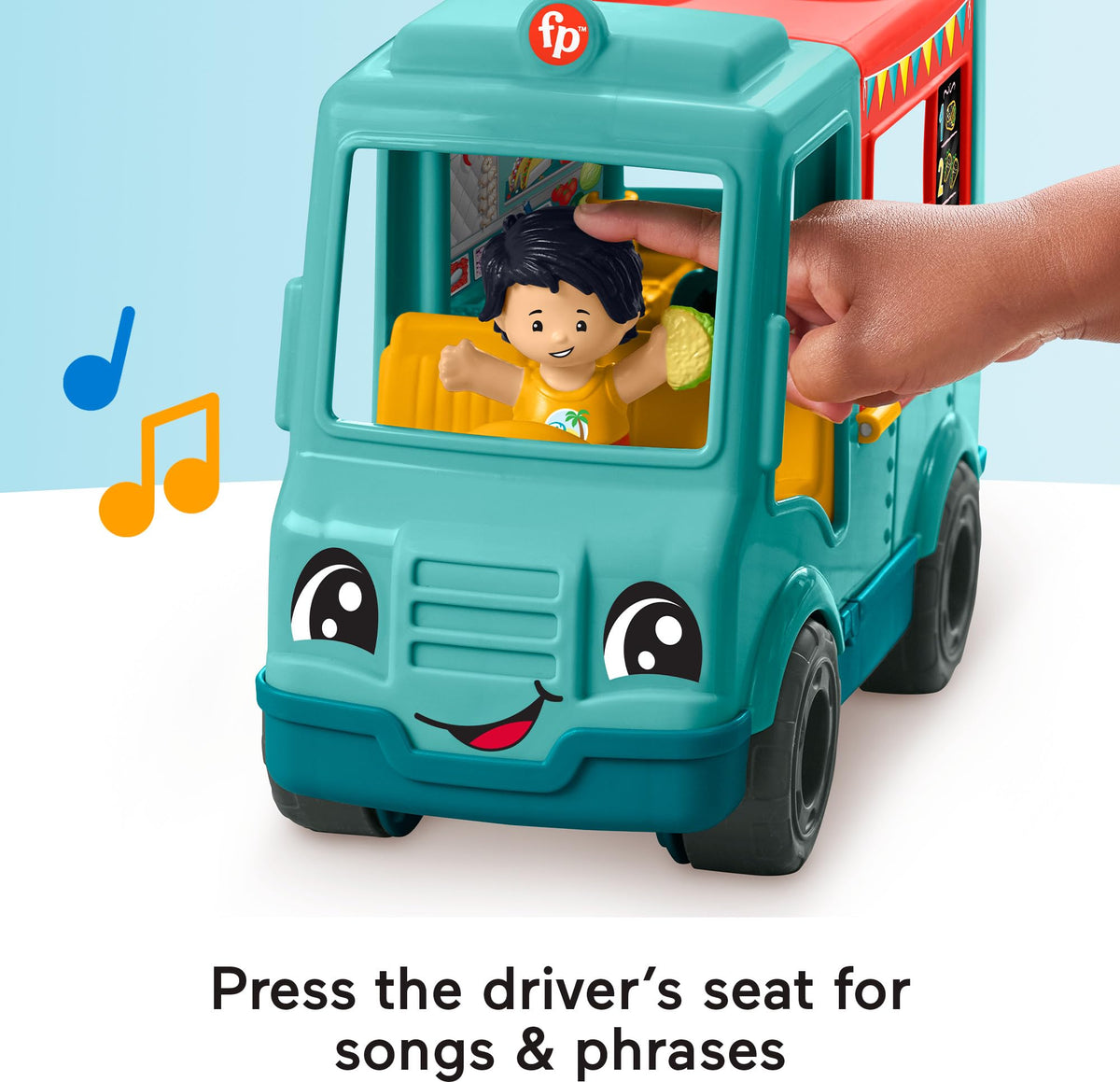 Top of Fisher-Price Little People food truck flips open to outdoor dining area