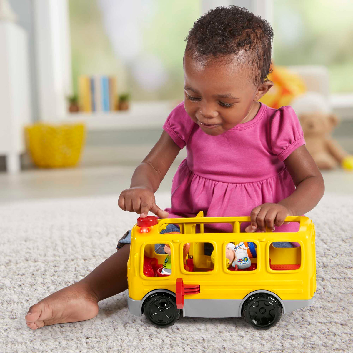 Fisher-Price Little People Sit with Me School Bus lights and sounds enhance pretend storytelling.