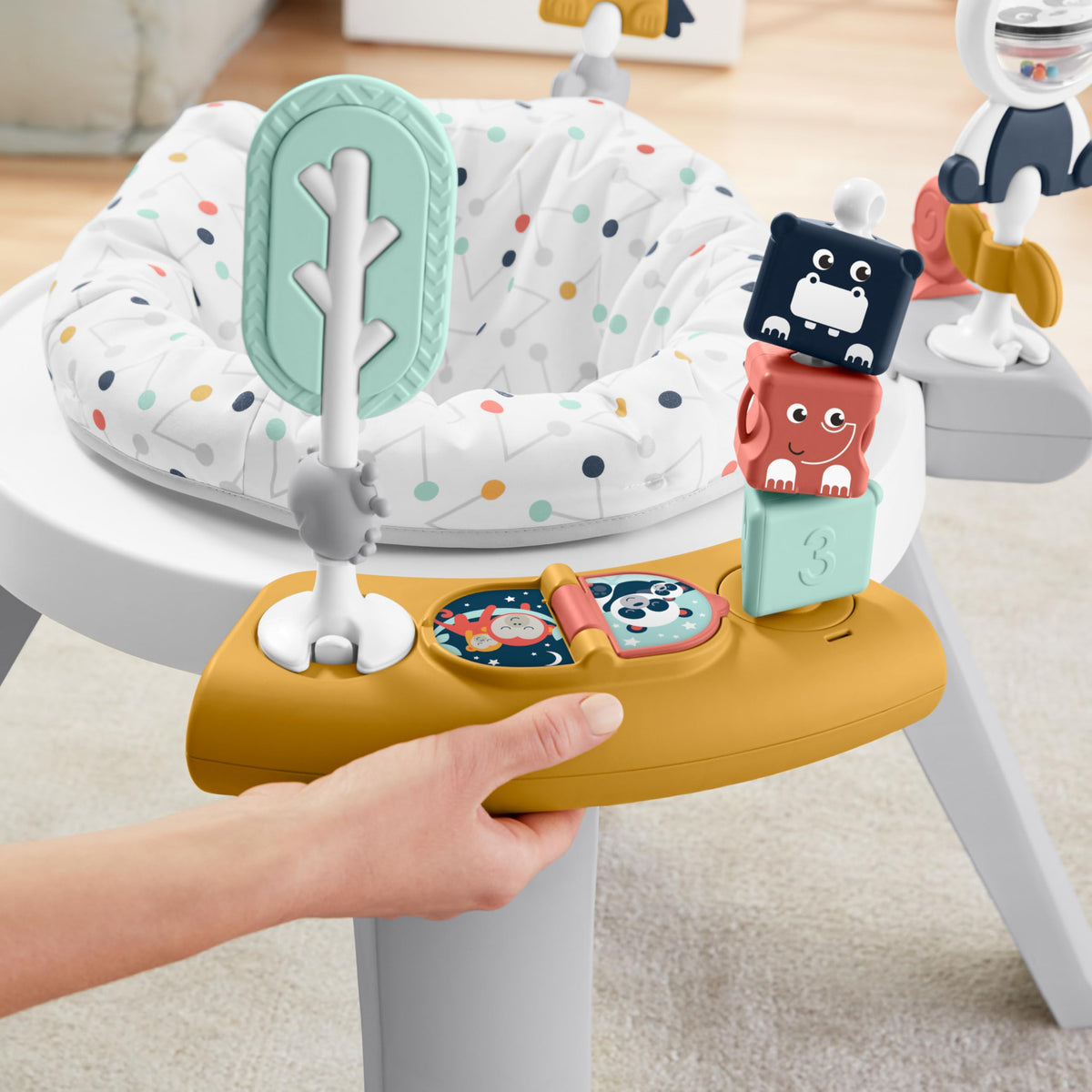 Fisher-Price Machine-washable seat pad cleans easily after spills.