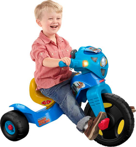 Fisher-Price PAW Patrol Trike front view highlighting its stable wide base for easy riding.