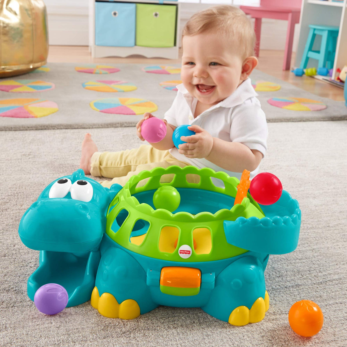 Fisher-Price Poppity Pop Dino close-up of colorful balls to stimulate visuals