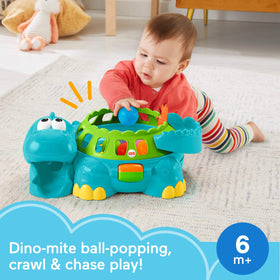 Fisher-Price Poppity Pop Dino side view showing popping action and wheels
