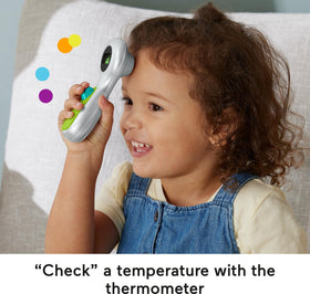 Fisher-Price Medical Kit blood pressure cuff with spinning gauge for interactive monitoring.