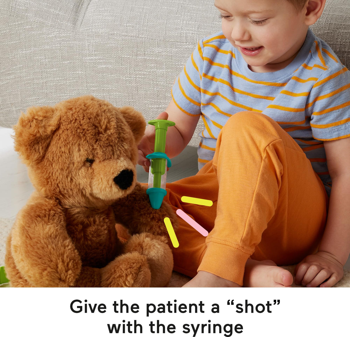 Fisher-Price Medical Kit syringe and bandage for playful treatment and comfort.