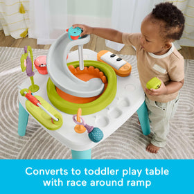 Fisher-Price Purple Monkey arc and mirror encourage reaching and self-discovery during play.