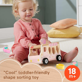 Fisher-Price push-along ice cream truck with colorful blocks for imaginative pretend play