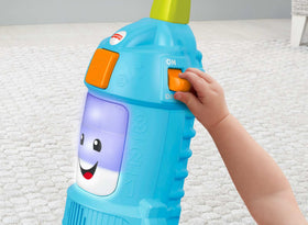 Fisher-Price Laugh & Learn vacuum push toy includes educational songs about colors and counting.