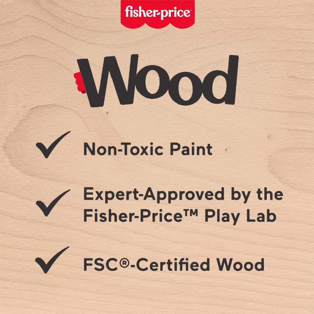 Close-up of non-toxic paint on Fisher-Price wooden blocks.