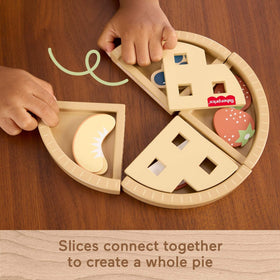 Fisher-Price wood fruit pie individual pieces support color sorting and early math.