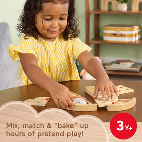 Fisher-Price wood fruit pie slices connect to form a complete pretend pie.