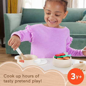 Fisher-Price wood kitchen pan for imaginative play and serving stories