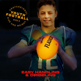 FlashCatch kids enjoying outdoor park practice with a glowing football.