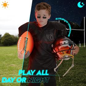 FLASHGLOW glow-in-the-dark football enhances backyard training after sunset.