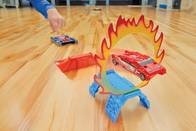 FLAT 2 FAST launch ramp with fire ring enables dramatic takeoffs during play.