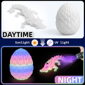 Flavery desk pet dragon egg on workspace adds playful focus.