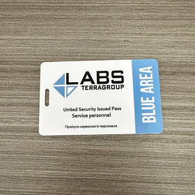 FLOORSOUTH red card TerraGroup cosplay prop on table