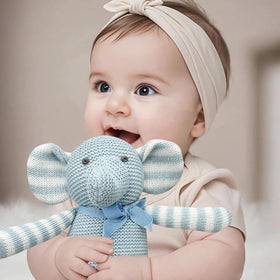 FluffyFun blue elephant plush face closeup, highlighting soft features.