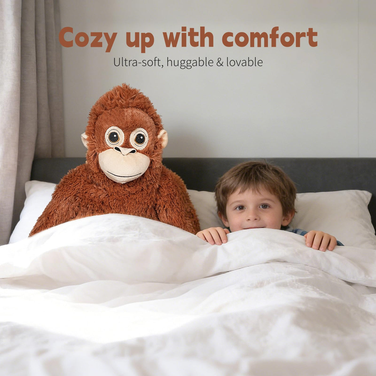 Fluffypals Punch Monkey hanging on a bag for everyday portability