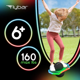 Flybar Pogo Glow Trick Ball being used indoors, perfect for rainy days.