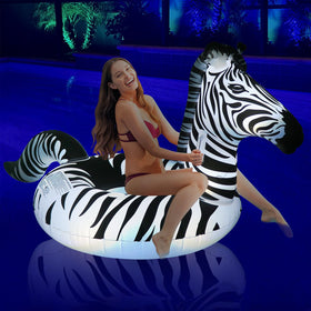 FlyfreeU inflatable zebra pool float with lights charges in sun for ambient glow