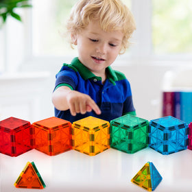 FNJO magnetic tiles child play demonstrates imaginative construction and cooperative activity.