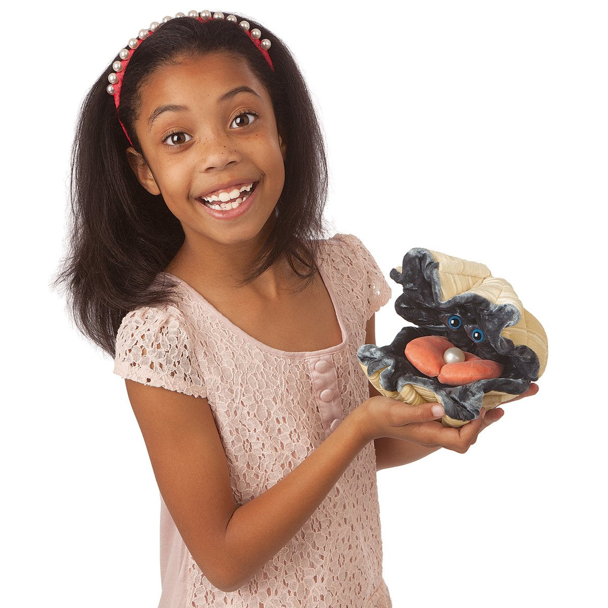 Folkmanis Giant Clam pearl reveals a playful surprise during performances.