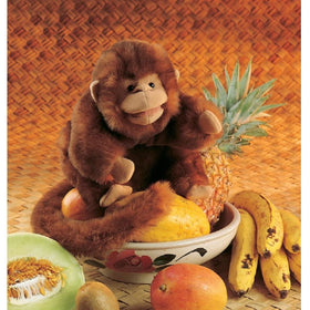 Folkmanis Monkey Hand Puppet mid-action demonstrating mouth and arm tricks