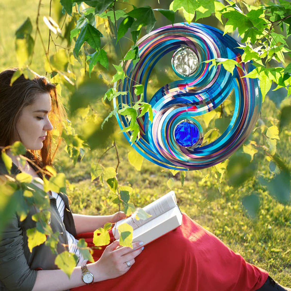 FONMY wind spinner hanging from a balcony railing with breeze