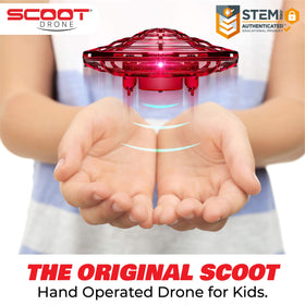 Force1 Scoot drone with LED lights in flight for vibrant indoor play.