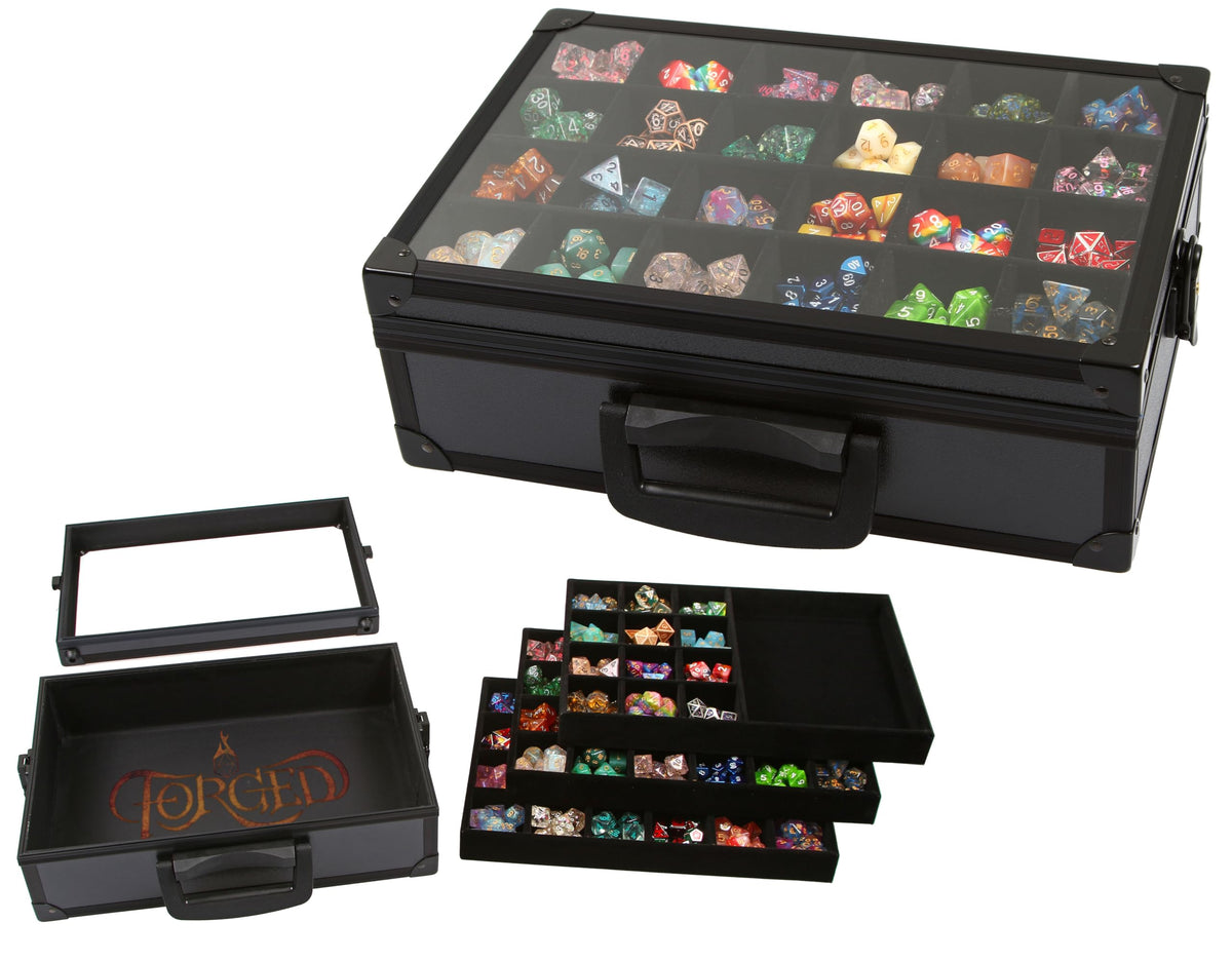 Forged Dice Co. dice display case with clear lid showing collection safely