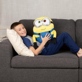 Franco Minions Bob pillow closeup fabric, soft plush material for hugs.