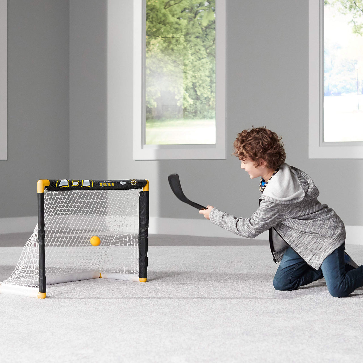 Franklin Sports NHL Boston Bruins mini hockey stick, right handed, ideal for beginner shooters.