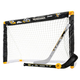 Franklin Sports Penguins mini hockey goal assembled for safe indoor practice.