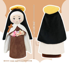 Free-Space St. Therese doll snuggling beside a child at bedtime.