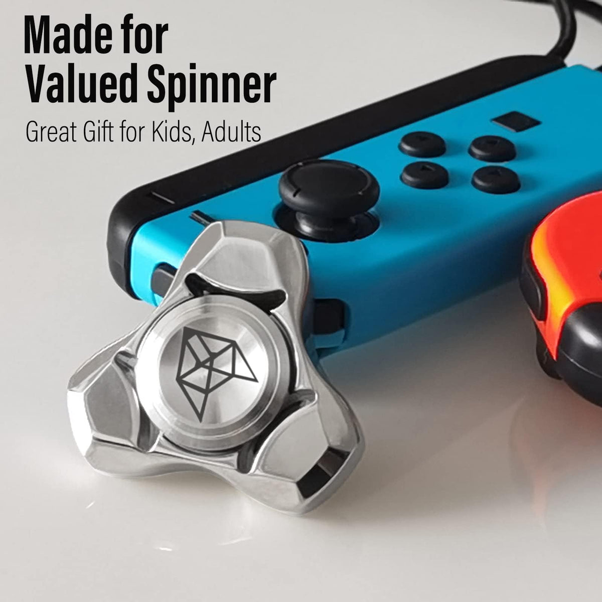 FREELOVE durable metal toy with replacement bearing included for continued spins.
