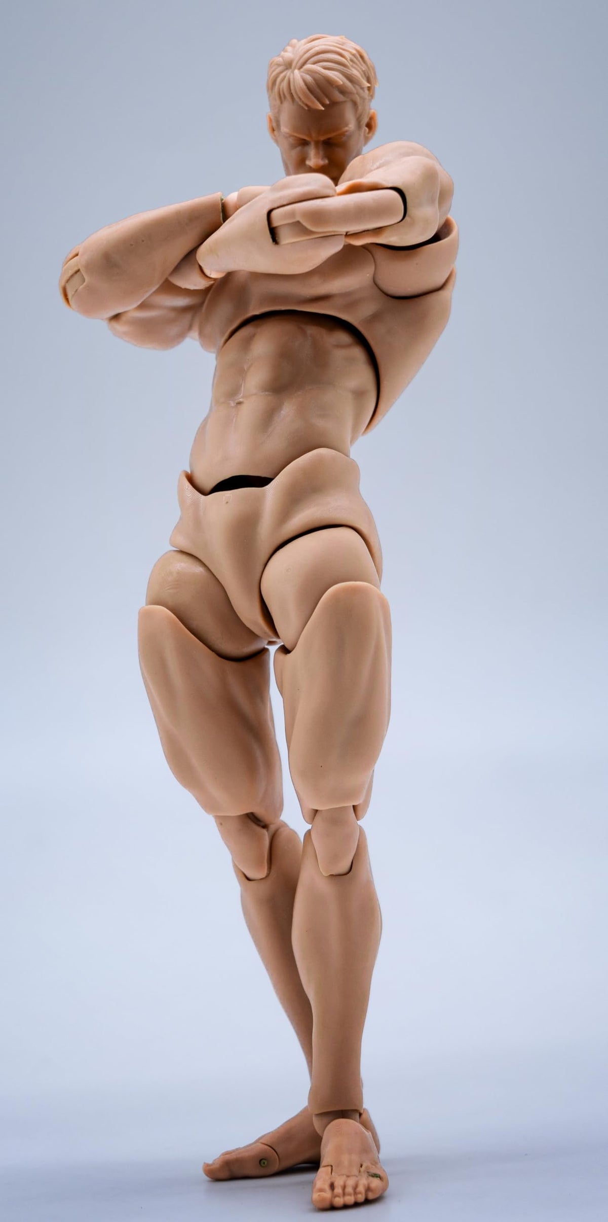 Fremego 1/12 scale male figure body, flexible posing for dynamic scenes.