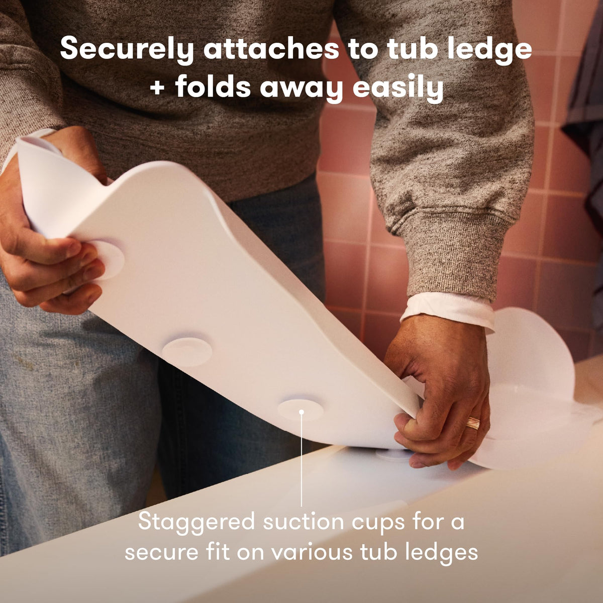 Frida Baby Splash Shelf easy-attach to most tubs.