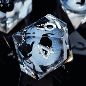 Froggod cat dice close-up showing liquid core and clear inclusions.